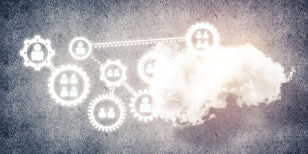 Background image with gears and cloud computing connection concept on concrete wallの写真素材