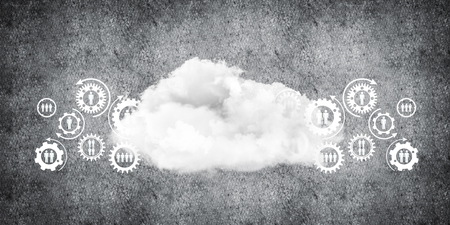 Background image with gears and cloud computing connection concept on concrete wallの写真素材