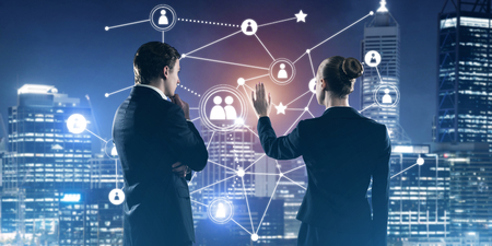 Businessman and businesswoman standing with back and touching connection conceptの写真素材