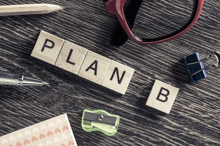 Words of business marketing collected in crossword with wooden cubesの写真素材