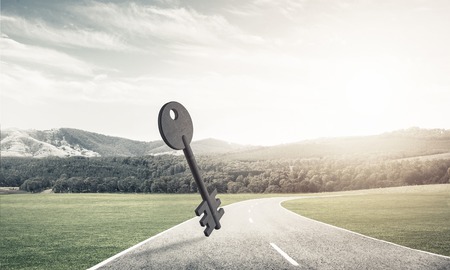 Key stone figure as symbol of access outdoor against natural landscapeの写真素材