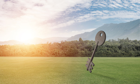 Key stone figure as symbol of access outdoor against natural landscapeの写真素材