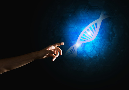 Close of man hand presenting DNA molecule research as concept. Mixed mediaの写真素材