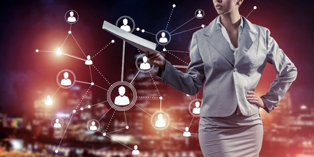 Close of businesswoman holding papers in hand and connection lines at backgroundの写真素材