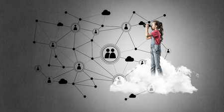 Cute smiling kid girl on cloud presenting social connection conceptの写真素材
