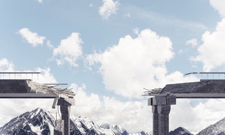 Broken concrete bridge with beautiful nature landscape, high mountains and cloudly skyscape on background. 3D rendering.の写真素材