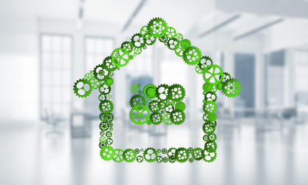 Conceptual background image with house sign made of connected gears. 3d renderingの写真素材