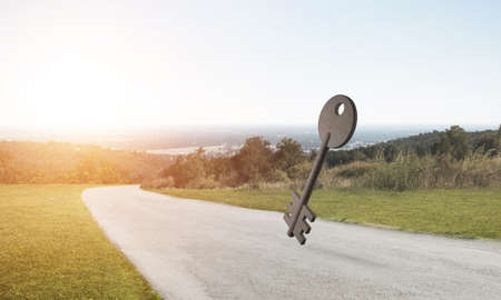 Key stone figure as symbol of access outdoor against natural landscapeの写真素材