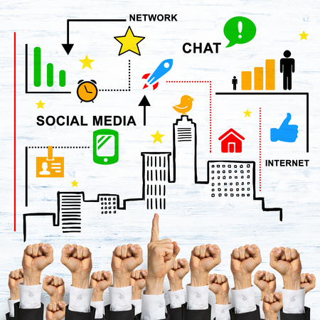 Group of hands of businesspeople showing gestures on wooden backgroundの写真素材