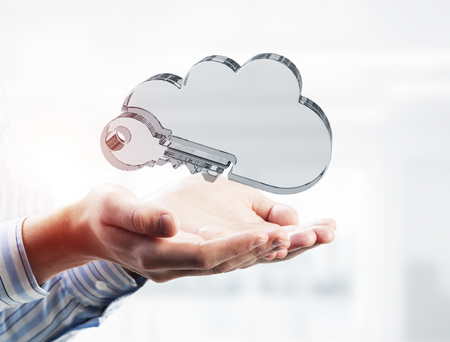 Close of businessman hands holding glass cloud computing concept. Mixed mediaの写真素材