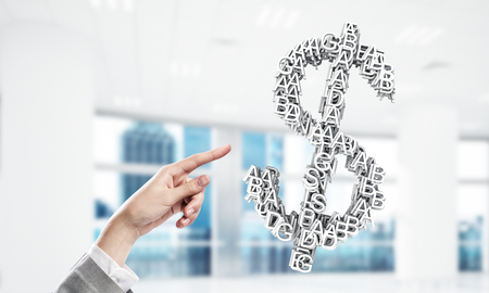 Close up of businessman touching white dollar symbol with finger. Mixed mediaの写真素材