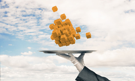 Cropped image of waiters hand in white glove presenting multiple cubes on metal tray with cloudy skyscape on background. 3D rendering.の写真素材