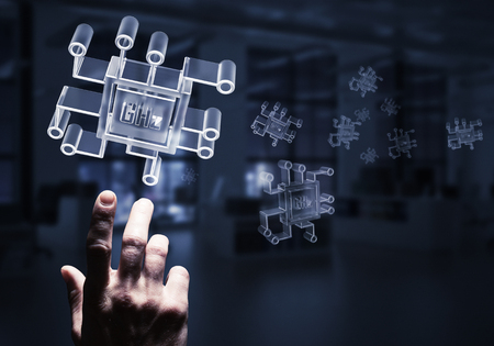 Close of businessman hand touching glass chip icon on dark office background. Mixed media