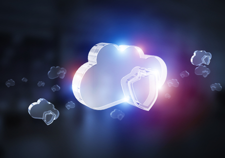 Glass cloud icon as concept for cloud computing on interior background. Mixed mediaの写真素材