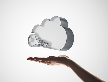 Close view of male hand showing cloud icon in palmの写真素材