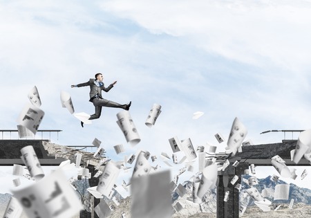 Businessman jumping over gap in bridge among flying papers as symbol of overcoming challenges. Skyscape and nature view on background. 3D rendering.の写真素材