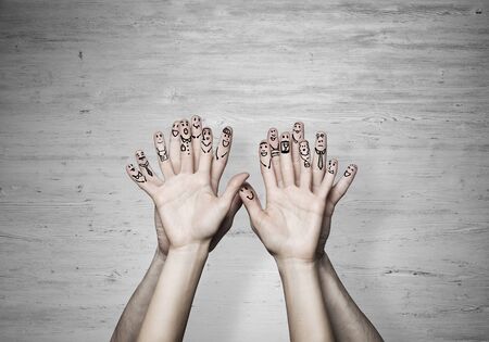 Hands of man and woman representing love and happinessの写真素材