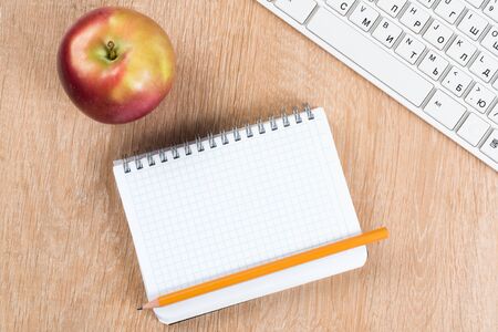 Back to school concept with keyboard blank notepad and pencilの写真素材