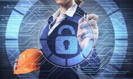 Computer security and information technology. Virtual padlock blue hologram and business woman with...