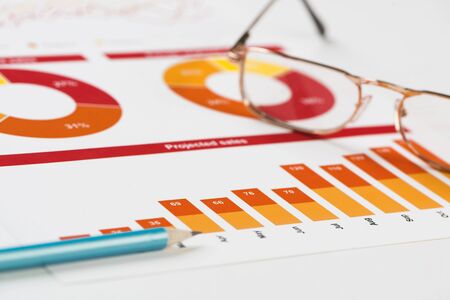 Charts and graphs of sales as symbol of successful corporate business