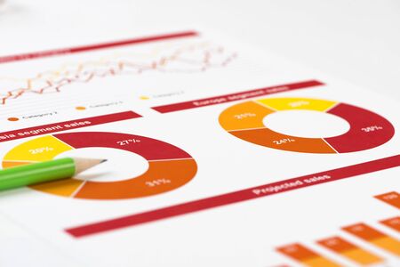 Charts and graphs of sales as symbol of successful corporate business