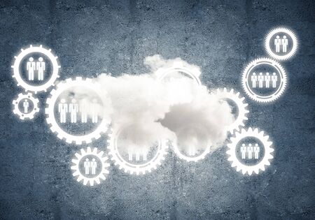 Background image with gears and cloud computing connection concept on concrete wallの写真素材