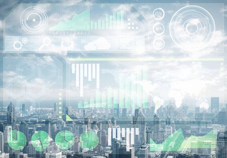 Double exposure business concept with abstract financial graphics on background of modern cityscape....