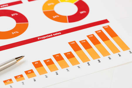 Charts and graphs of sales as symbol of successful corporate business