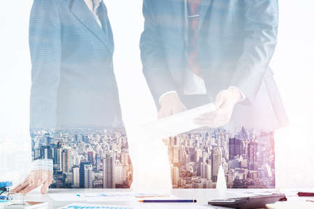 Business partnership concept with business people. Office desk with financial analytics. Business meeting in conference hall. Presentation and discussion of new startup project. Strategy developmentの写真素材