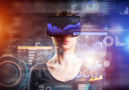 Young attractive woman in VR glasses. Immersion in the virtual world.