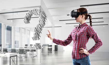 Young woman in virtual reality helmet and question white symbol. Mixed media