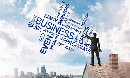 Businessman writing business related and success conceptual words. Mixed mediaの写真素材
