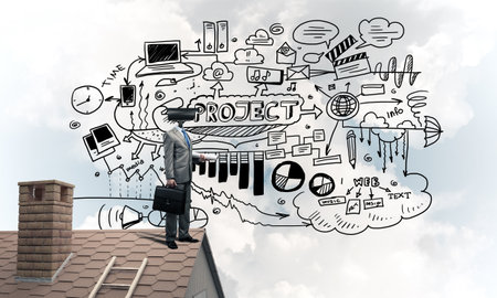 Faceless businessman with camera zoom instead of head standing on house roofの写真素材