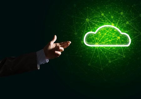 Businessman hand holding cloud computing concept in palmの写真素材