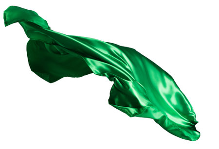 Green cloth flutters in the wind. Isolated on white background