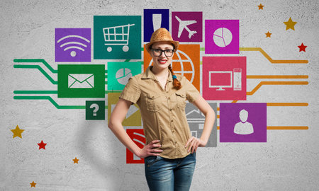Young pretty girl and color application icons at backgroundの写真素材