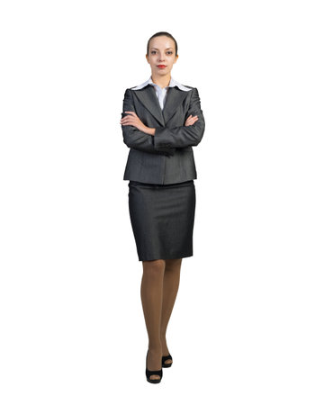 Young attractive businesswoman. Full length portrait on a white backgroundの写真素材