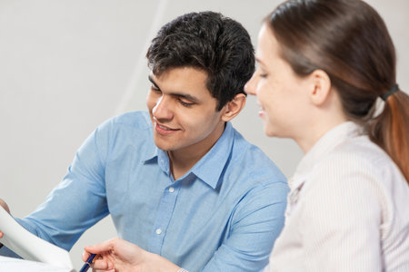 portrait of a young man at a business meeting. concept of team workの写真素材