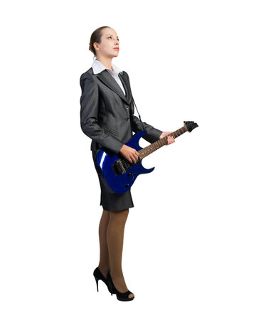 Attractive businesswoman with electric guitar. Creativity and speed in businessの写真素材