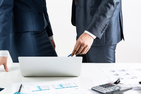 Business partnership concept with business people. Office desk with financial analytics. Business meeting in conference hall. Presentation and discussion of new startup project. Strategy developmentの写真素材