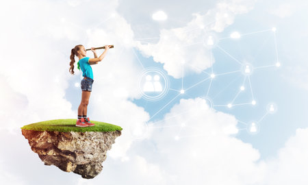 Cute smiling girl on floating island presenting social connection conceptの写真素材