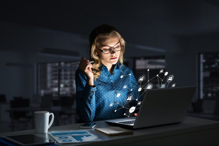 Beautiful girl looking in glowing laptop screen. 3d renderingの写真素材