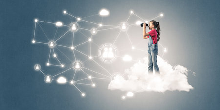 Cute smiling kid girl on cloud presenting social connection conceptの写真素材