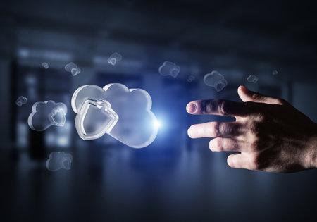 Close of businessman hand touching glass cloud computing concept. Mixed mediaの写真素材