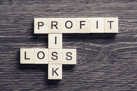 Words of business marketing collected in crossword with wooden cubesの写真素材