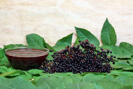 Ready decoction of elderberry juice on the tableの写真素材