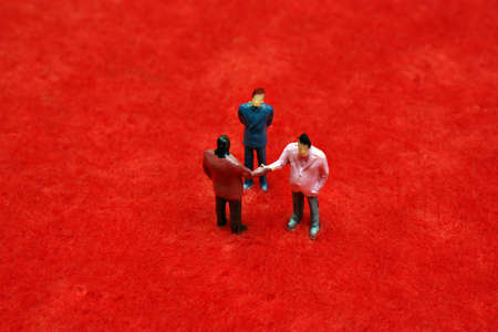 Business meetings and negotiations on a red の写真素材