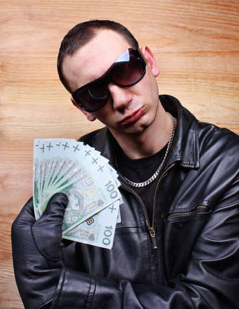 Mafia gangster with a fan polish money