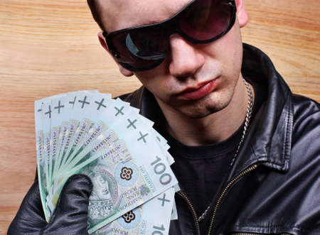 Chief boss mafia gangster thug with stolen money euroの写真素材