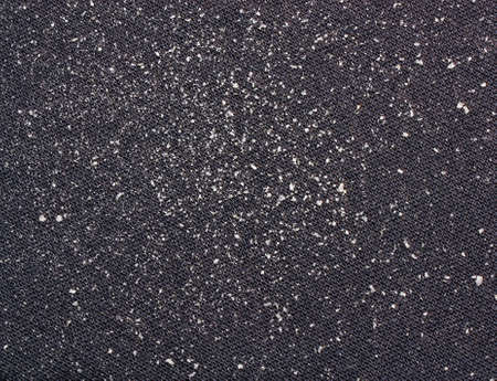 Pieces of dandruff on clothesの写真素材